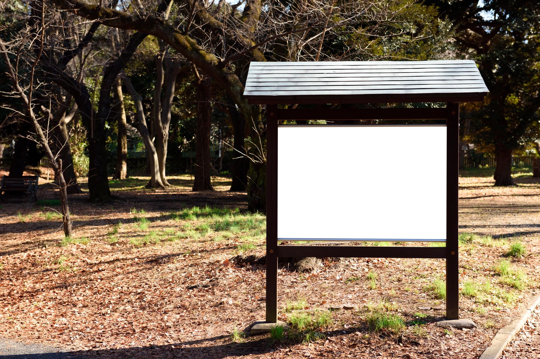 Wooden bulletin board in a park